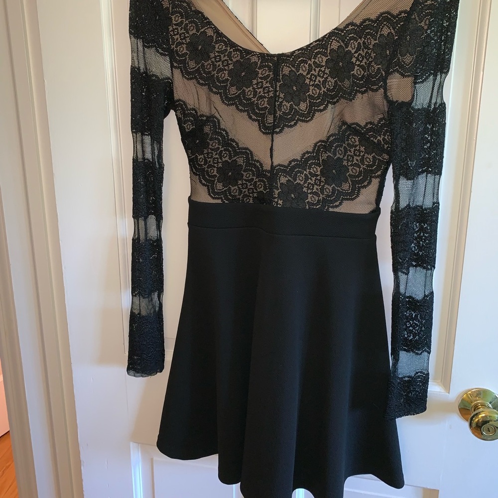 Black long sleeved cocktail dress !